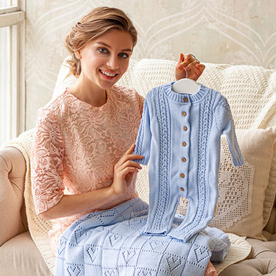 Вязаный комбинезон "Косички" голубой