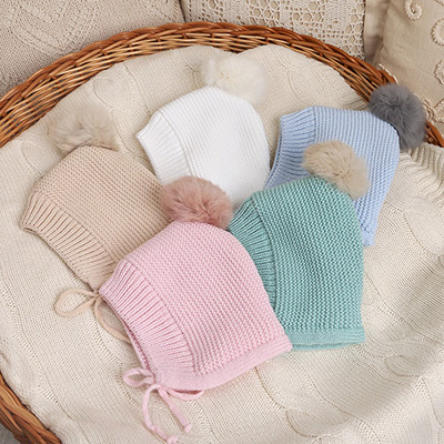 Фото товара "Вязаная шапочка-чепчик розовый с помпоном" из магазина ЛиноБамбино