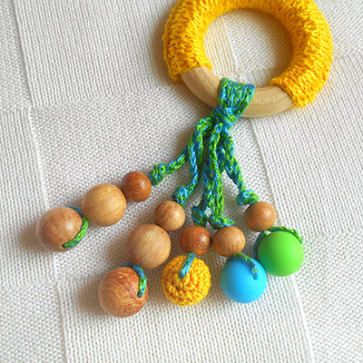 Фото товара "Слингобусы Солнечный день с деревянным грызунком" из магазина ЛиноБамбино