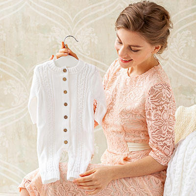 Вязаный комбинезон "Косички" молочный