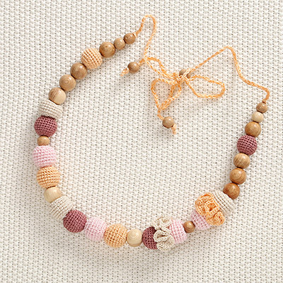 Слингобусы Карамель, деревянно-вязаная игрушка - миниатюра фотографии товара в каталоге ЛиноБамбино