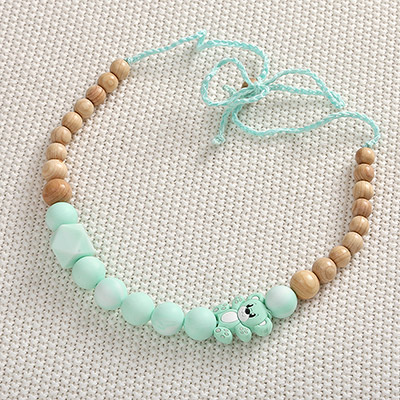 Фото товара "Слингобусы Мишка силиконовые" из магазина ЛиноБамбино