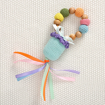 Вязаная слинго-погремушка - миниатюра фотографии товара в каталоге ЛиноБамбино