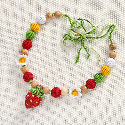 Фото товара "Слингобусы Клубничка, деревянно-вязаная игрушка" из магазина ЛиноБамбино