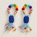 Вязаная слинго-погремушка