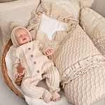 Вязаный комбинезон "Косички" бежевый